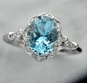 Aqua Marine Daisy oval halo engagement ring vintage inspired